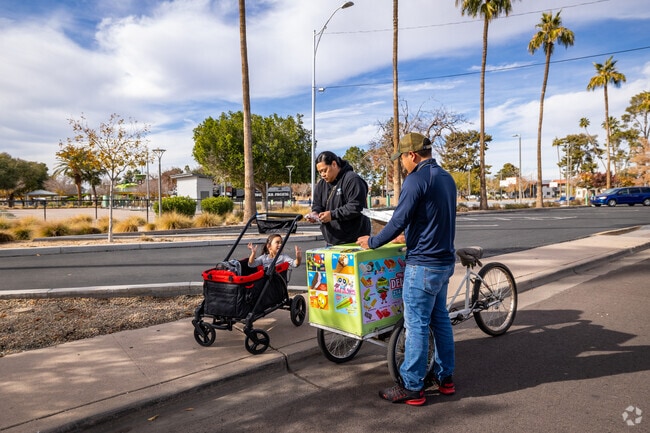 The ice cream man brings smiles and sweet moments to Mesa Patios streets.