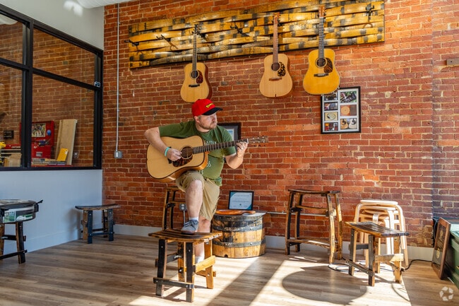 Faris Guitar Company hand builds acoustic guitars in Old Owensboro.
