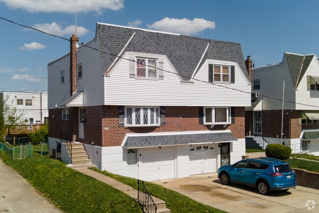 Brick & Siding 2 Story Twin Home with Attached Garage in the Pennypack neighborhood.
