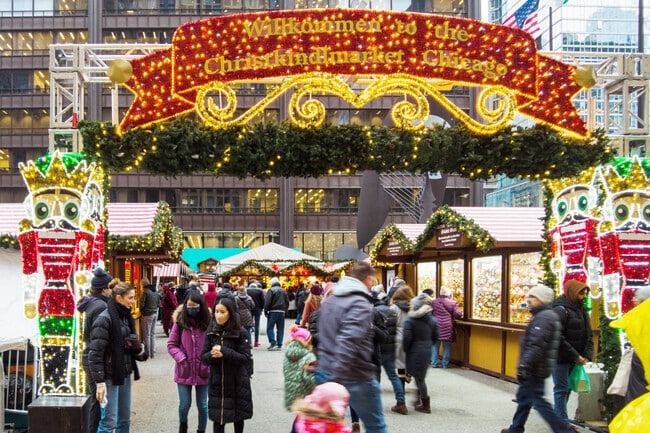 Families enjoy a cold day at the Christkindlmarket in Chicago.