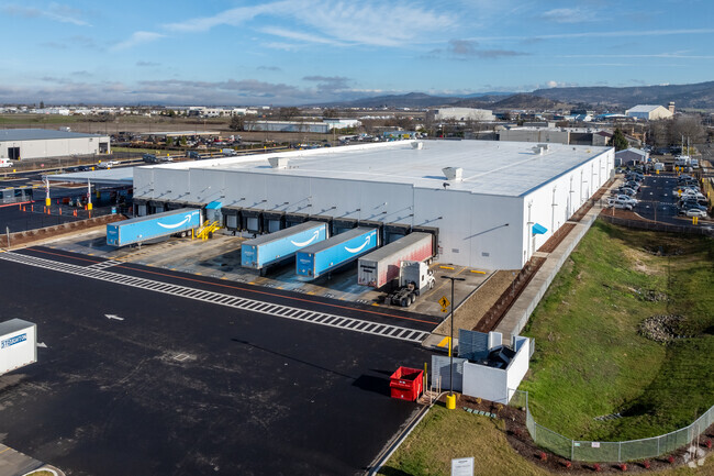 A newly built Amazon warehouse provides jobs and commerce for the residents of Medford.