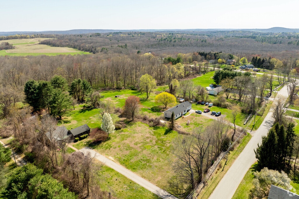 Scotland is a rural neighborhood in Connecticut where homes are spaced far apart on large lots.
