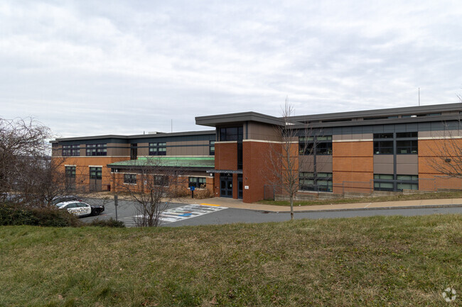 A closer look at the front right side of Matthew J. Kuss Middle School in Fall River, Mass.
