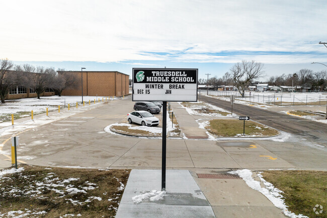 There is a sign for near the main road.