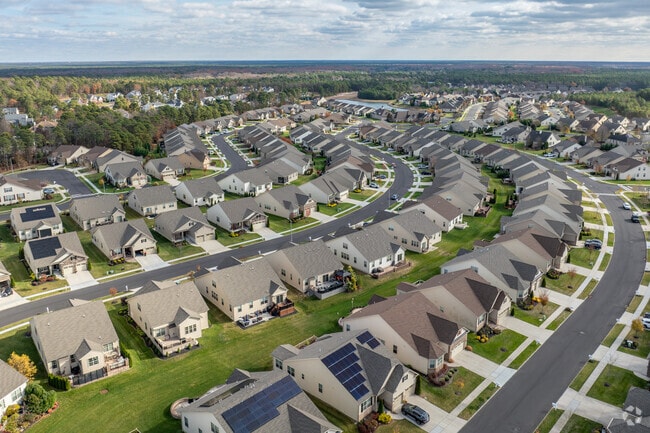 Well-maintained New Traditional homes line the quiet streets of Berlin Township.