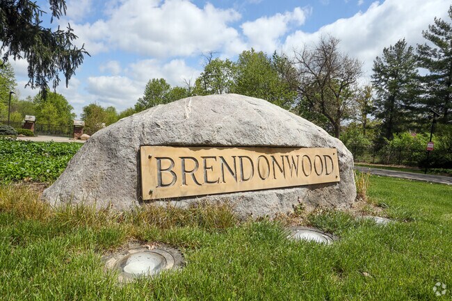 A stone marker marks the entrance to the Brendonwood neighborhood.