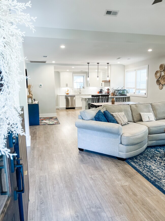 Open concept living, dining and kitchen