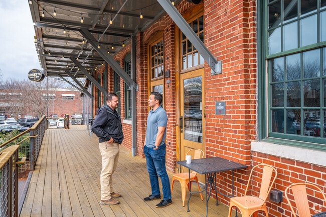 Locals enjoy the boardwalk on North Shore near Riverside.