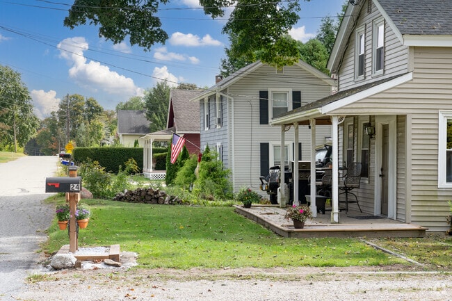Colchester homes with porches and lawns offer classic New England curb appeal.