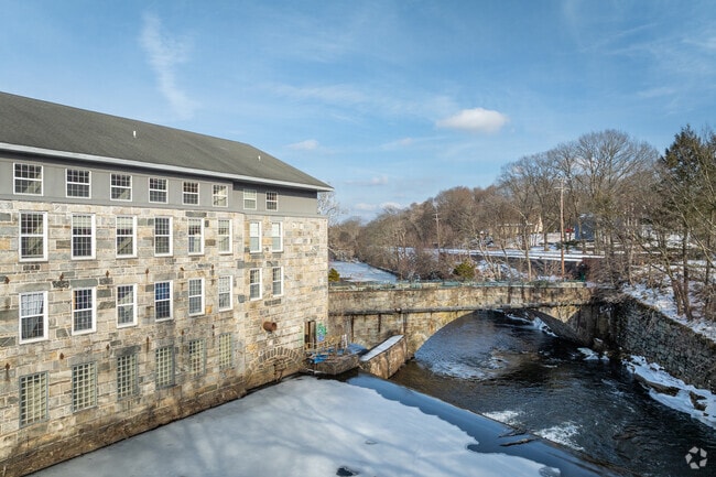 The Willimantic River offers a view of the town’s historic mills and industrial heritage in the city of Willimantic.