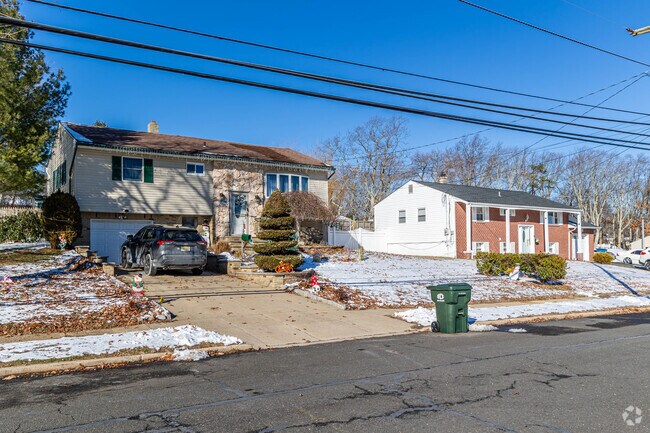 Rows of split-level homes line the streets of Candlewood as its most popular housing type.