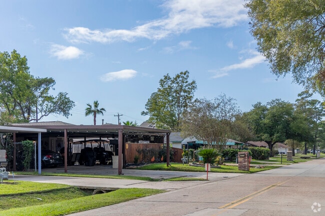 Classic ranch-style homes with carports define welcoming living in Barrett's neighborhood.