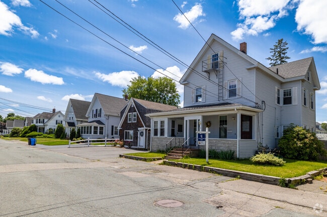 Whitman boasts a picturesque row of homes, each exuding its own unique charm.