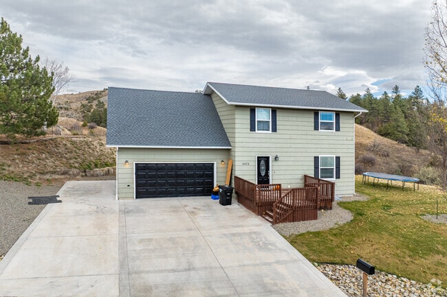 Two-story home sits among rolling hills in Blue Creek near Billings.