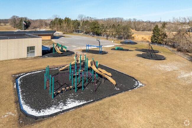 Students at Farmington Elementary School in Kewaskum, WI can play on the provided playground.