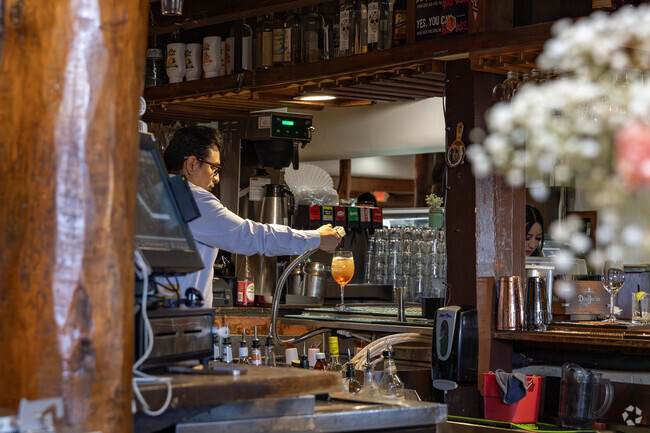 A bartender makes a delicious beverage at the Bourbon Cafe in Old Las Vegas Corridor.