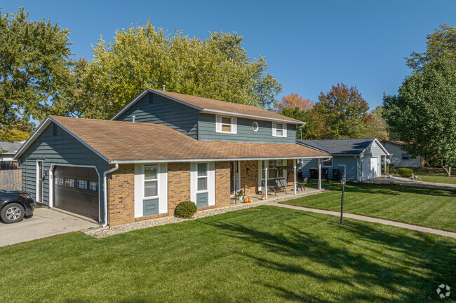 Bullerman Park Forest offers many different Colonial-style homes, some with side garages.
