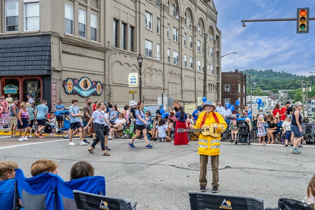 Crowds pack Pike Street for the Fourth of July Parade and fireworks.