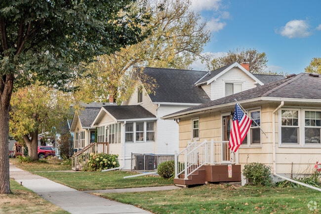 Tourtellotte Park has several different style homes along its sidewalk lined streets.