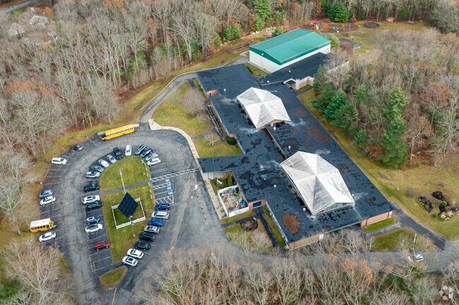 Aerial views of The Sage School unveil a picturesque campus harmonizing with nature.