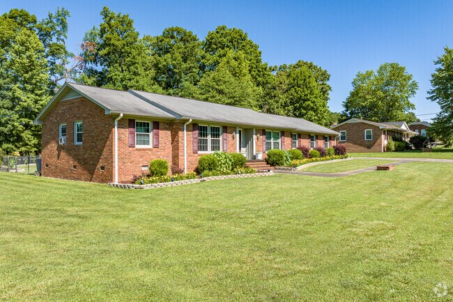 Ranch-style homes sit on spacious grassy lots in Groometown.