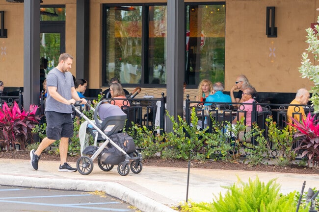 Residents enjoy the open-air mall in Palm Beach Farms.