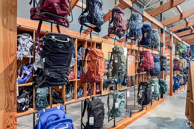 REI is a popular shop in White Oaks for outdoor enthusiasts.