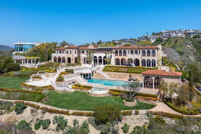 Given the elevated location of Mystic Hills, these Mediterranean-style homes often offer panoramic views stretching from Catalina Island to the Dana Point Headlands, making sunset views particularly breathtaking.
