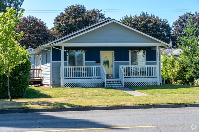 The 3rd Ave neighborhood boasts charming bungalows with inviting front porches.