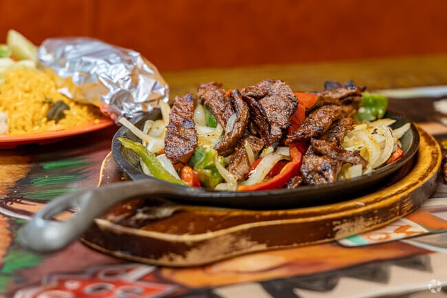 Sahuayo Mexican Restaurant & Grocery serves piping hot steak fajitas in Gonzales.