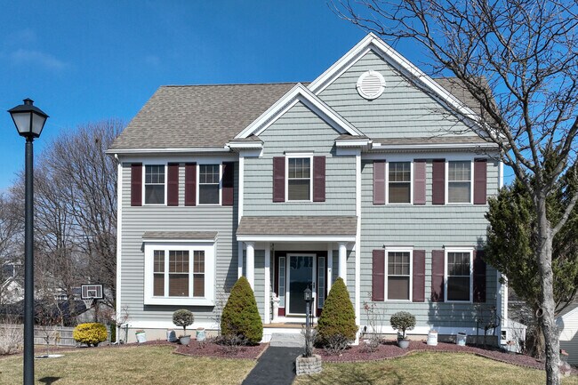 Clusters of newer, spacious single-family colonial homes branch off of Highland Avenue.