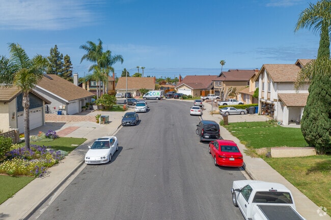 North Chula Vista streets are wide, shaded, and lined with well-kept lawns and mature trees.