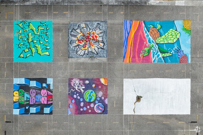 Murals cover the ground of the recess area at Anna P. Mote Elementary in Wilmington.