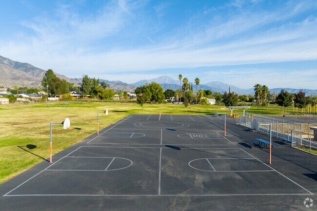 Budding athletes shoot hoops at Cole Elementary School courts.