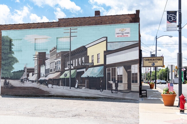 Murals of the town's history line Market Street in East Palestine.