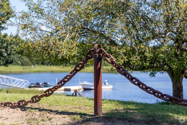 A nautical chain as a fence by the Cole River in the Luther Corner neighborhood is emblematic.