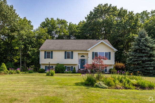 This charming Garrison Style home is one of many you will find in Holbrook.