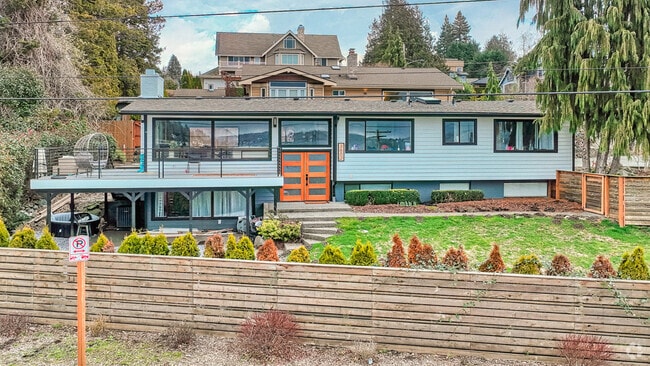 There are various styles of homes in Kennydale, like this two-story with a colorful door.