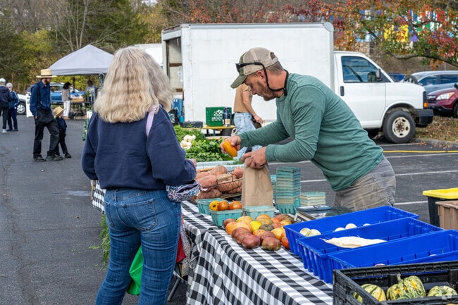 Local vendors are happy to help Taylor residents as they visit the Boalsburg Farmers Market.