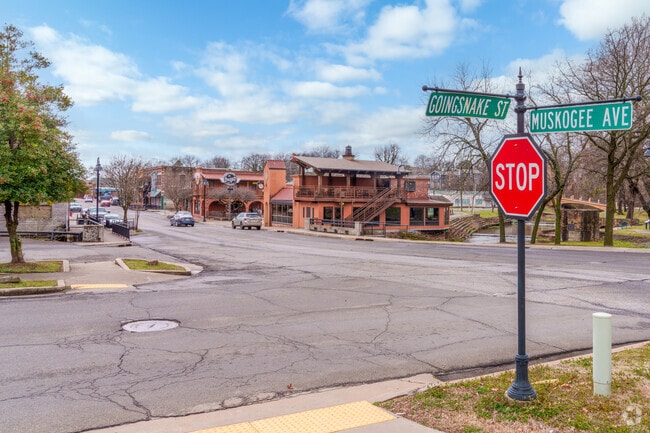 The Muskogee Avenue street sign in Tahlequah marks a prominent and bustling area.