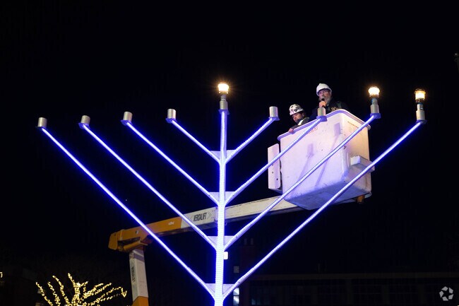 The Rabbi from the Chabad of the Beaches lite the Chanukah Menorah in Long Beach.
