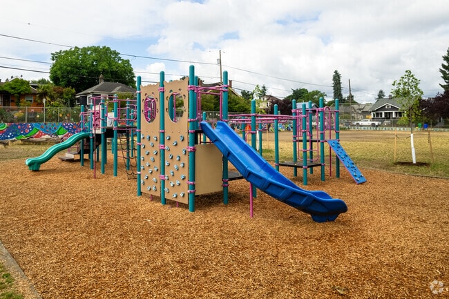 The play structure between the basketball court and soccer field behind the Vernon School.
