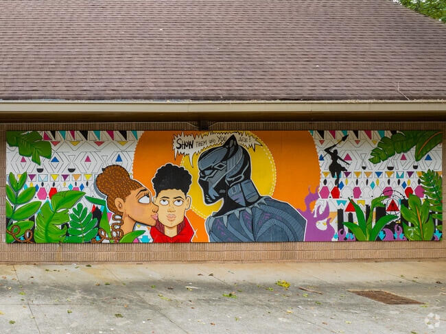 Vibrant AD Williams Park murals referencing Marvel's Black Panther inspire in Collier Heights.