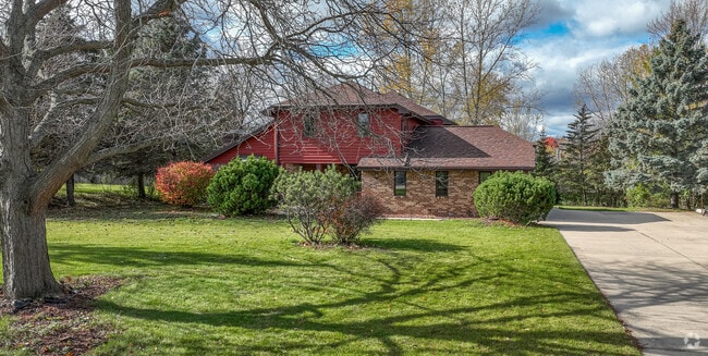 Find a lovely split-level home with lot's of space in Greenfield.