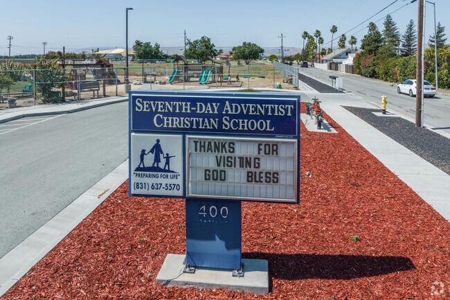 Signs welcome students and their families to Hollister SDA Christian School .