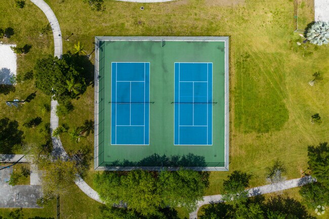 Southern Estate Park features tennis courts and paved walking paths.
