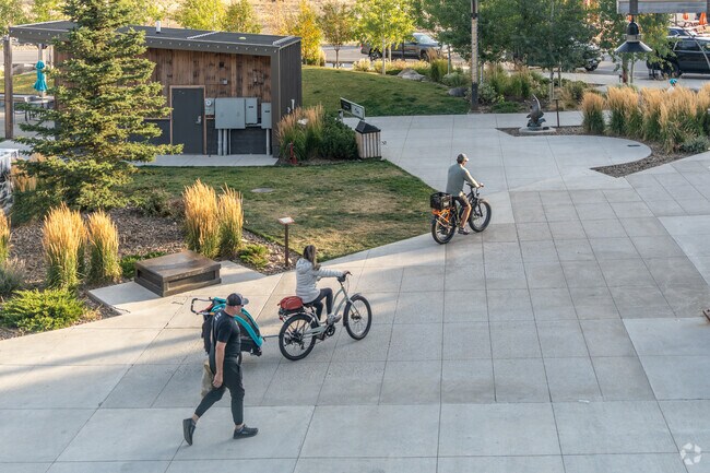 Big Sky living is all about outdoor adventure with residents enjoying skiing and biking.