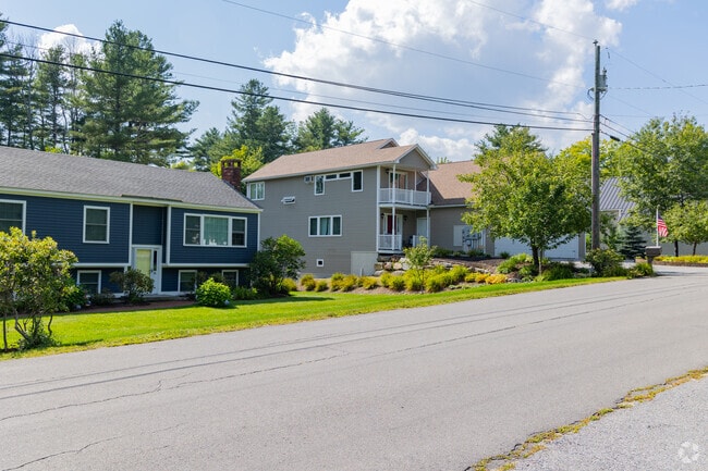 A charming row of homes in Warner featuring classic New England architecture and charm.