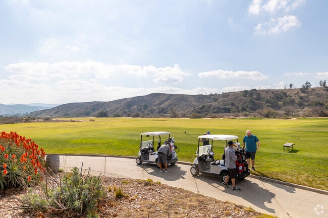 Golf along the scenic mountains at the Rustic Canyon Golf Course.