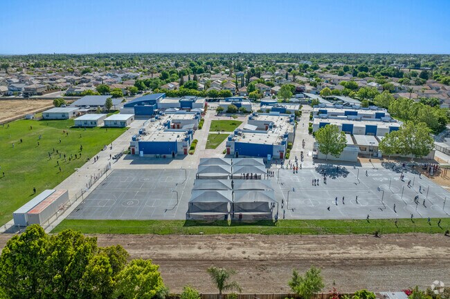 George Kelly is fostering growth academically  in Tracy.